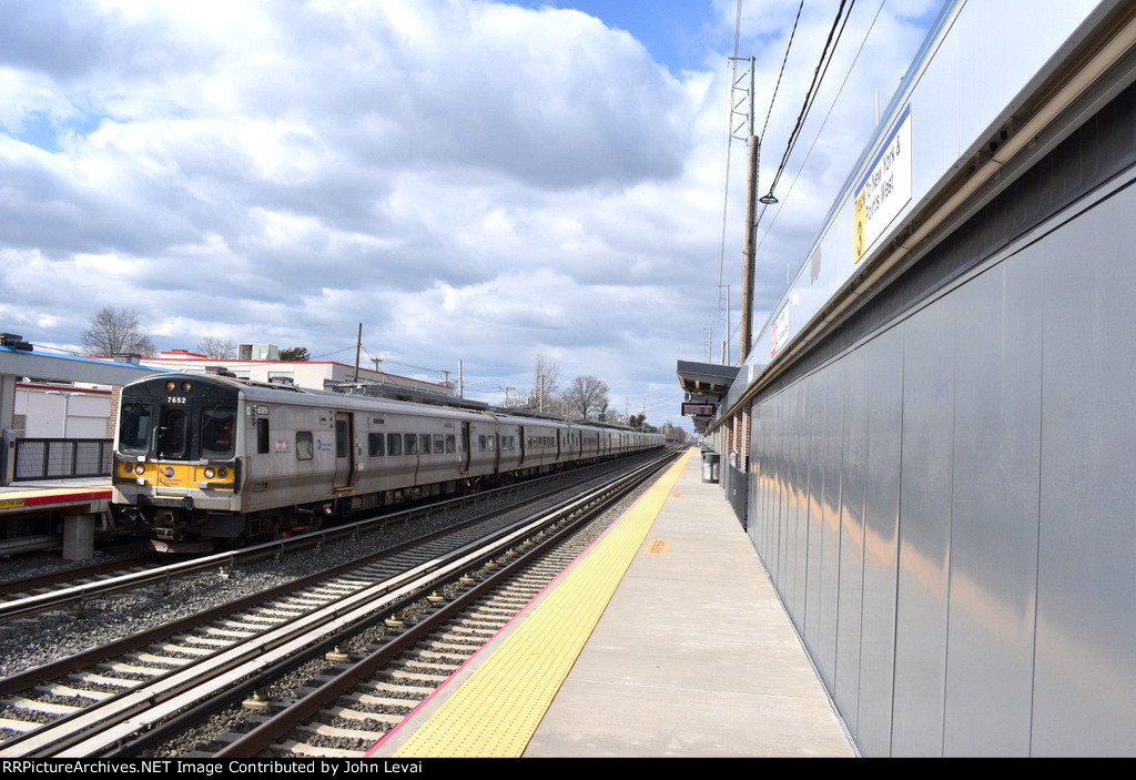 Inbound LIRR train of M7 cars at New Hyde Park station 